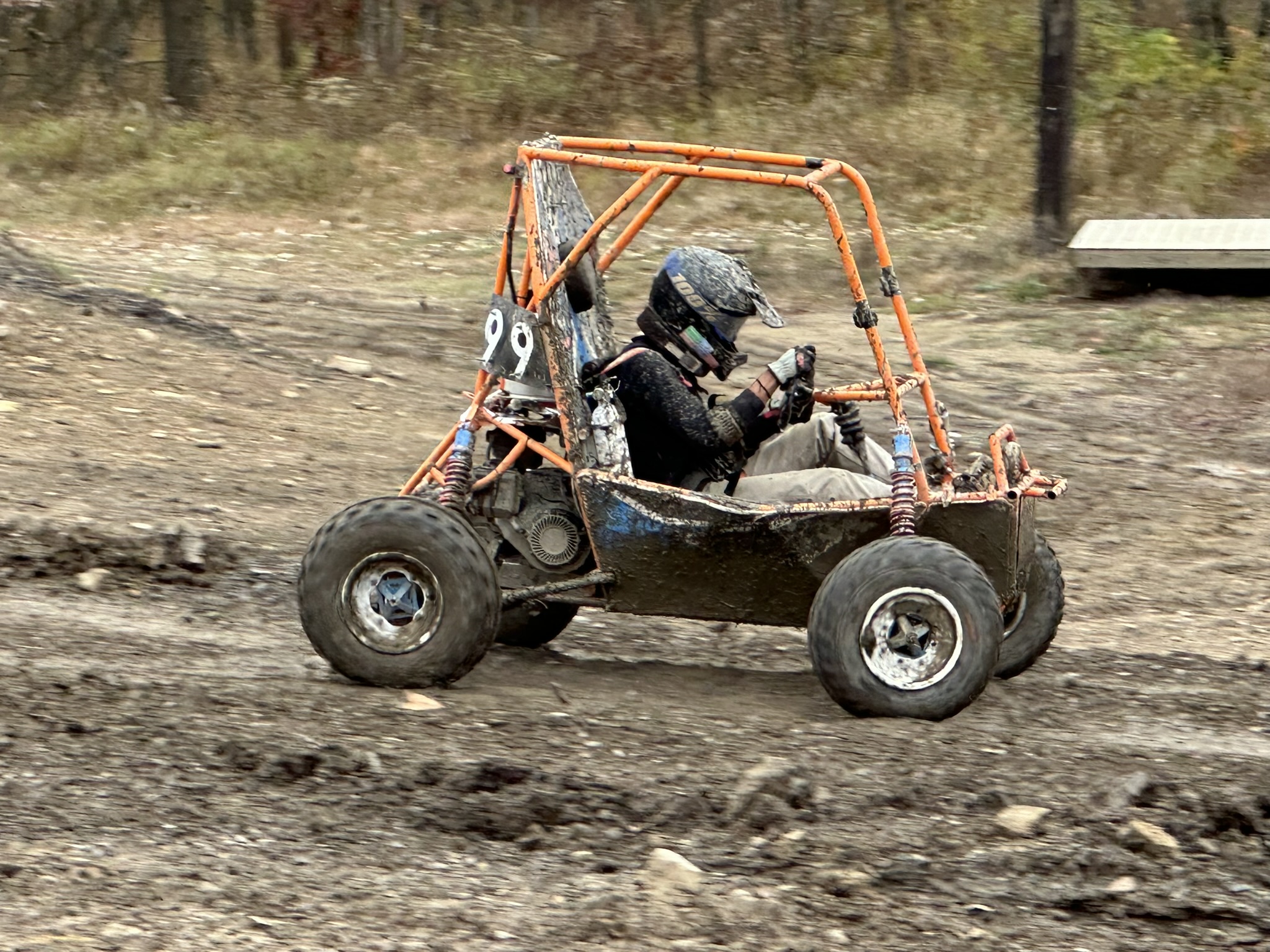 Photo of a Baja SAE vehicle driving off road